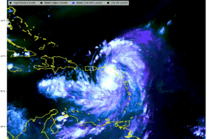 A strengthening Ernesto will become a hurricane this evening